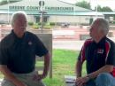 Hamvention's Mike Kalter, W8CI (left), speaks with DX Engineering COO Tim Duffy, K3LR.